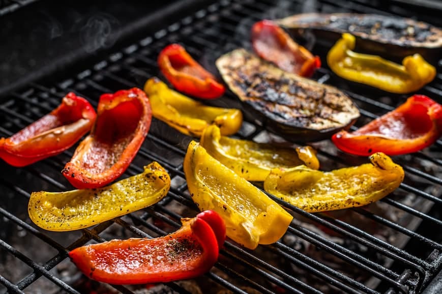 vegetables cooking on a grill